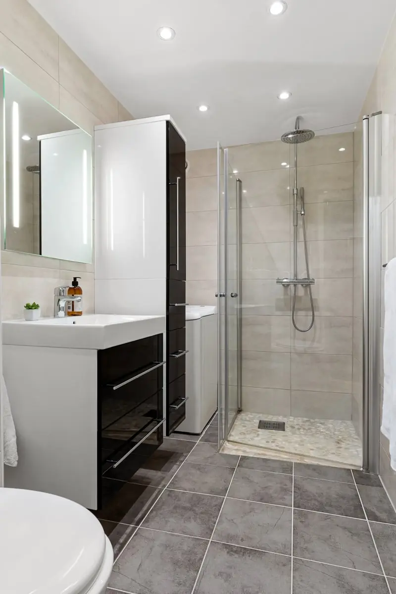 Selected vanity, faucet, and shower finishes in a Findlay bathroom remodel