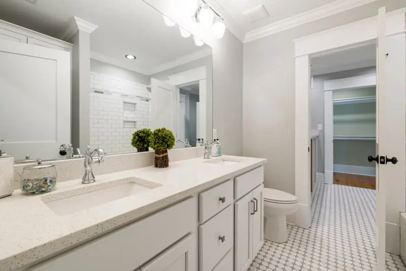 Clean white bathroom vanity after a Findlay remodel