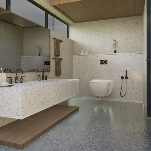Floating vanity and wall-hung toilet above a continuous curbless tile floor