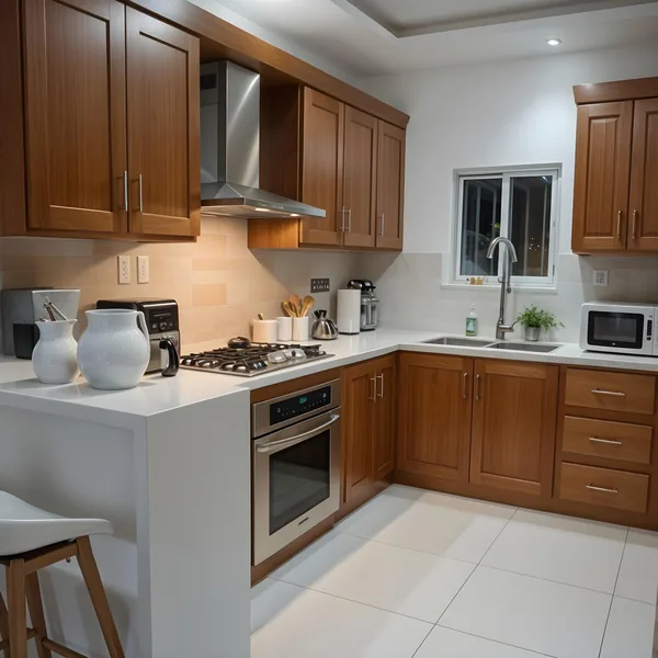 Kitchen peninsula with a marble surround, seating, and wood cabinetry